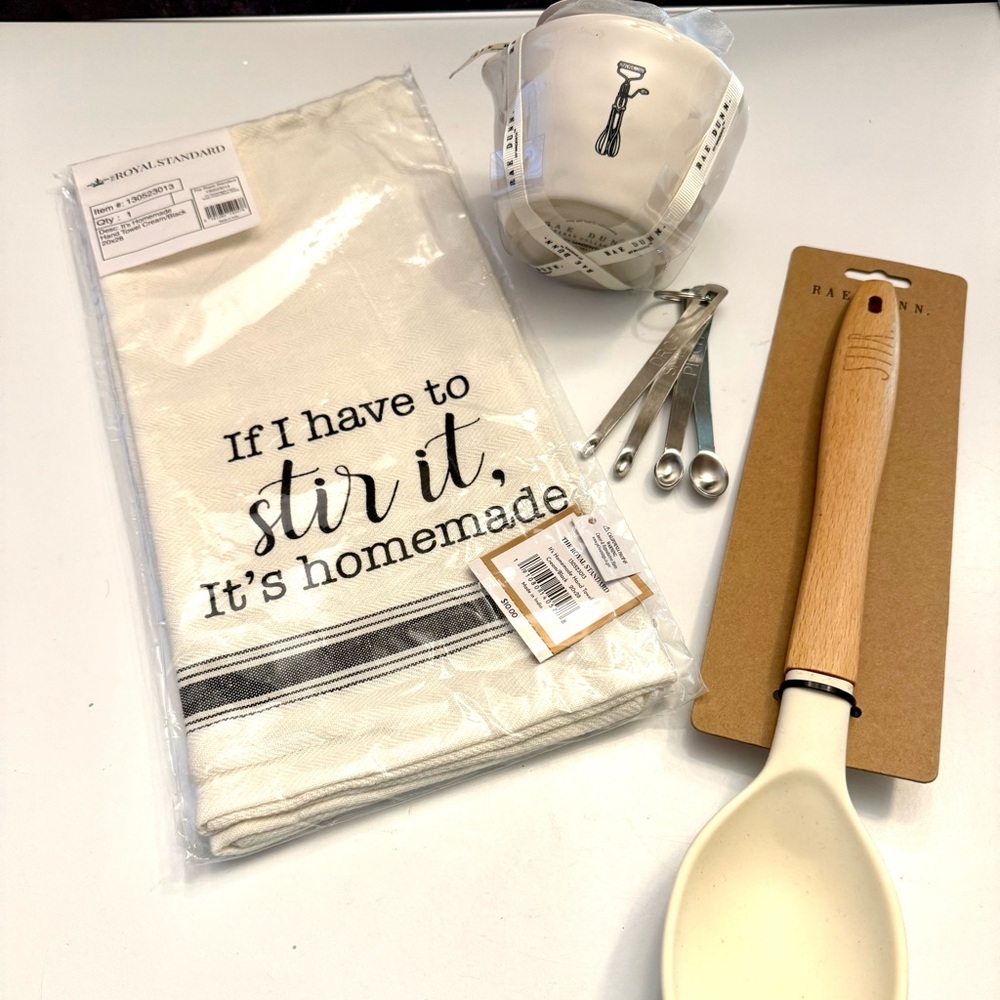 Rae Dunn White/Black Kitchen Measuring cups and accessories.